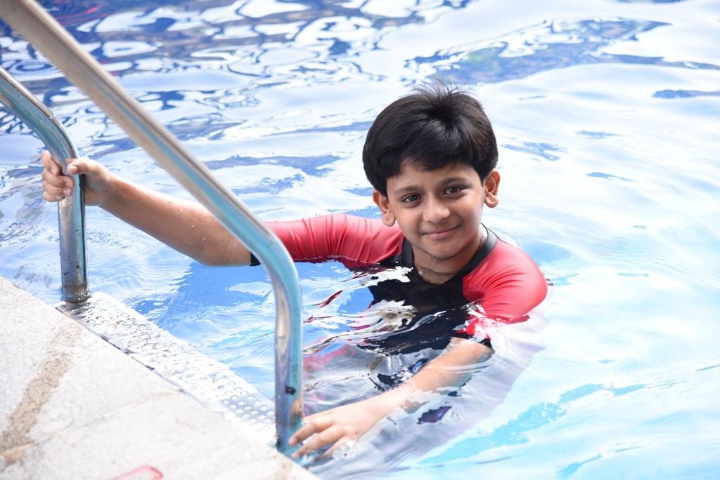 Swaastik swimming joyful moment